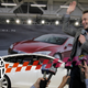 Tesla CEO Elon Musk waves during a rally at the Tesla factory in Fremont, Calif., Friday, June 22, 2012.